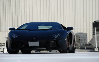 Black sports car building fence - a fence free wallpaper