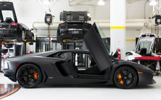 Black sports car open garage - the doorway free wallpaper