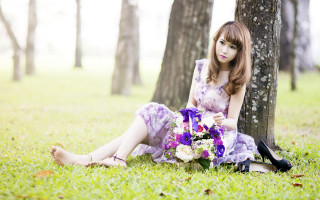 Woman sitting in grass bouquet - a bouquet of flowers free wallpaper