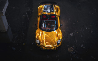 Yellow sports car night sky - a parking lot free wallpaper