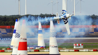 Futuristic plane over cones cityscape - a track free wallpaper