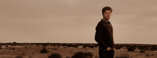 Man desert sky clouds background - andrew bell free wallpaper