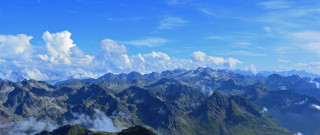Mountain range clouds plane nature - a view of a mountain range free wallpaper