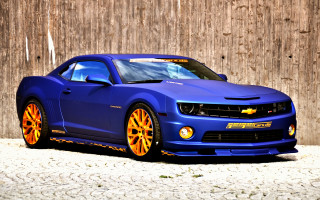 Blue car orange wheels wooden - a wooden fence behind free wallpaper