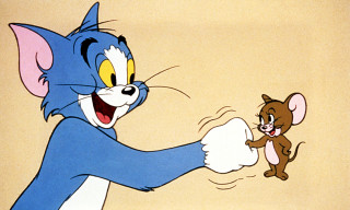 Cartoon character holding mouse cat - a mouse free wallpaper