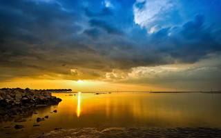 Sunset water cloud boat landscape - a sunset over a body of water free wallpaper