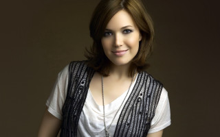 Woman smiling white shirt black - a black vest free wallpaper