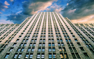 Tall building cloudy sky bridge - constructivism free wallpaper