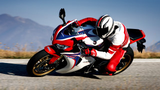 Motorcycle rider mountains grass helmet - redshift free wallpaper