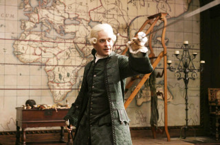 Man green coat pointing map - a wooden bench free wallpaper