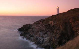 Lighthouse cliff ocean sunset pink 10 - radiant free wallpaper
