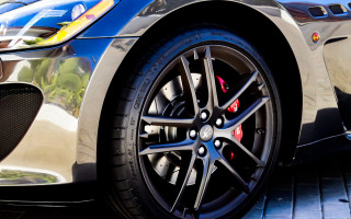 Car tire street sky building - sharp detail free wallpaper