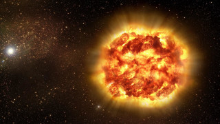Bright orange sun black sky - explosion free wallpaper