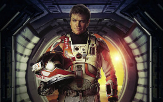 Space suit man holding helmet 2 - a man in a space suit holding free wallpaper