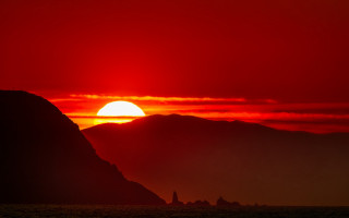 Sunset mountain red sky ocean - a sunset free wallpaper