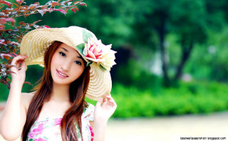 Woman hat flower park posing - a flower free wallpaper