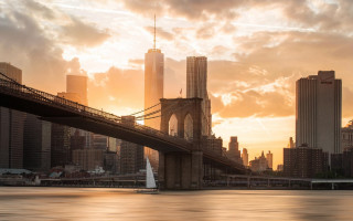 Sailboat bridge city sunset water - under a bridge free wallpaper