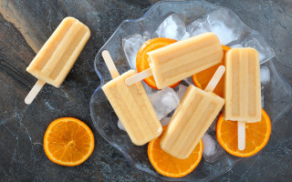 Orange slice couple on ice - an orange slice free wallpaper