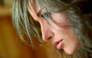 Woman cellphone blurry background portrait - facial feature free wallpaper