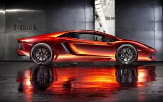 Red sports car garage reflection - a reflection free wallpaper