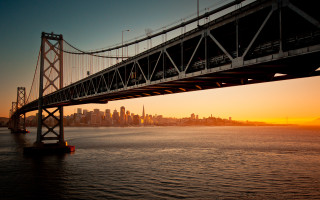 Bridge water city sunset power - a bridge over a body of water free wallpaper