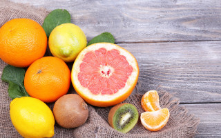 Fruit table cloth oranges kiwis - a table together free wallpaper
