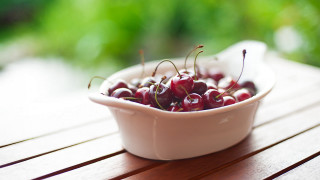 Bowl cherries outdoor wooden table - betty merken free wallpaper