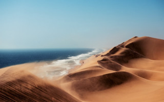 Desert dune ocean sky clouds - the background and a sky background free wallpaper