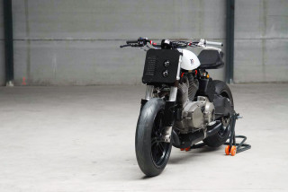Motorcycle parked garage wall open - cybernetic free wallpaper