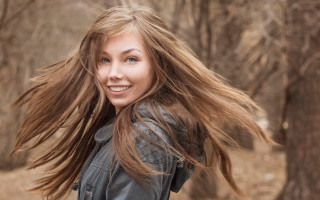 Woman blonde longhair smiling forest - the wind free wallpaper