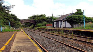 Train track building bridge sky - a train track free wallpaper