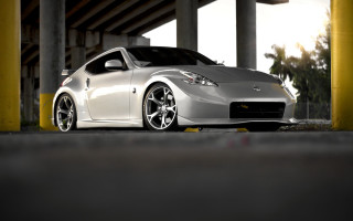 Silver sports car parking garage 7 - a parking garage next free wallpaper