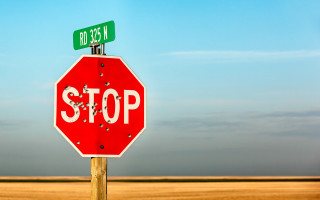 Stop sign street grass dirt - a street sign free wallpaper