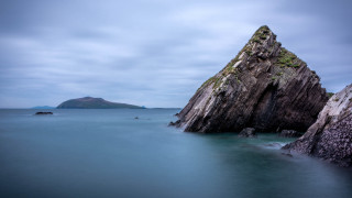 Ocean rock mountain shore sky - free ship wallpaper