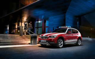Red bmw suv night man - promotional image free wallpaper