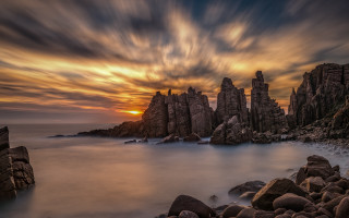 Rocky beach sunset clouds water 3 - a rocky beach free wallpaper