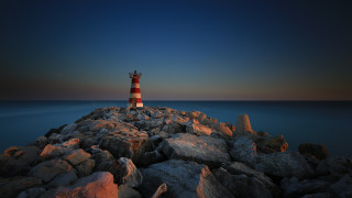 Lighthouse rocky shore night moon 2 - a lighthouse free wallpaper