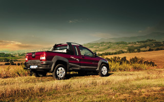 Red truck mountains cloudy sky - a red truck free wallpaper