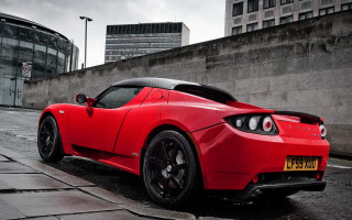 Red sports car marble sculpture - the side of a road next free wallpaper