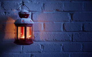 Lantern candle brick wall ambient - a brick wall in the background free wallpaper