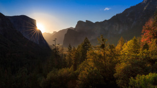Sunshine mountains trees lake sky - a mountain range in the background free wallpaper