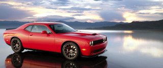 Red car reflective surface mountains - a red car free wallpaper