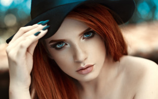 Red hair black hat blue - a woman free wallpaper
