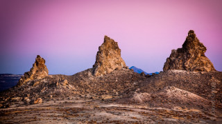 Desert rocks purple sky land - a group of rocks free wallpaper