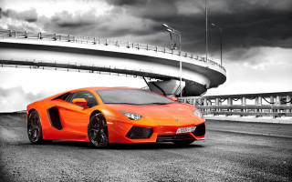Orange sports car parking lot - nice free wallpaper