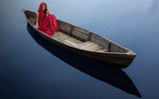 Woman red dress boat water 2 - elsa bleda free wallpaper