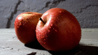 Two apples table dark background - a shadow free wallpaper