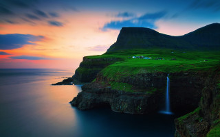 Waterfall cliff house sunset lake - the middle of a body free wallpaper