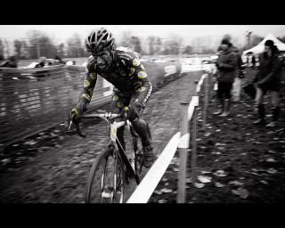 Man riding bike dirt road - impressionist free wallpaper
