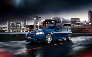 Blue car city night skyline - a city street free wallpaper